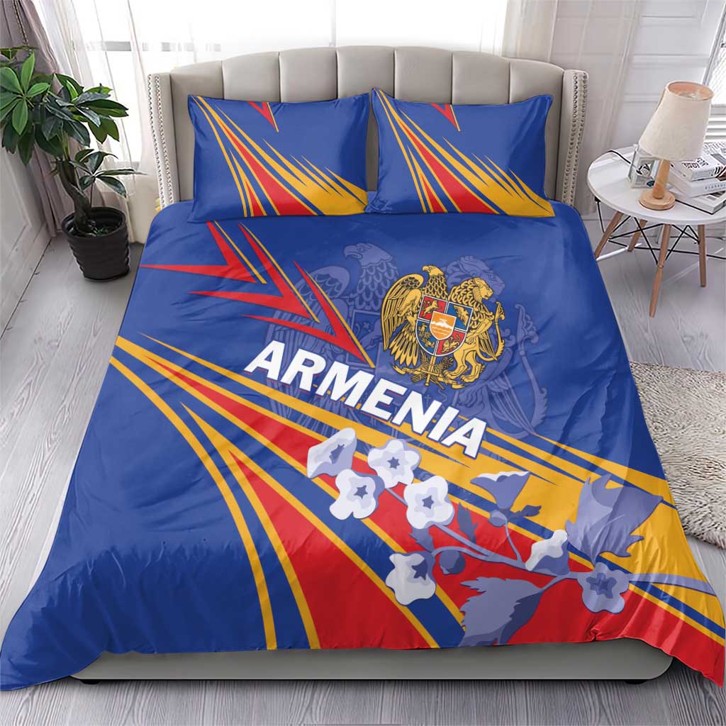 Blue bedding set with two pillows; Armenia lettering, gold crest, and red yellow ray lines
