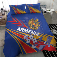Blue duvet and pillow set with Armenia crest and bold fan-shaped stripe pattern in red and yellow