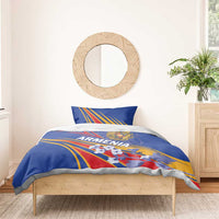 Blue Armenia bedding set with duvet and pillow; crest and colorful ray stripes design