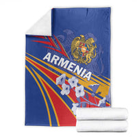 Folded blue Armenia flag blanket with eagle crest, bold “Armenia” text, and rays
