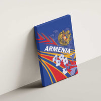 Blue canvas wall art with Armenia lettering, gold emblem, and red, yellow ray graphics.