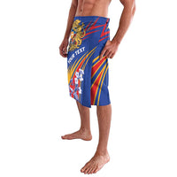 Blue printed wrap skirt with crest graphic, yellow stripes, and floral motif