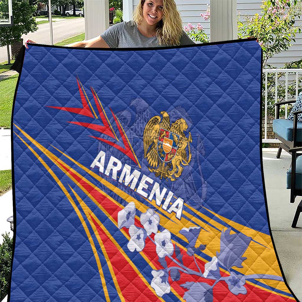 Blue quilted Armenia flag blanket held up outdoors