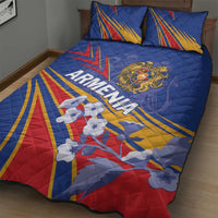 Blue quilt bed set on bed with Armenia emblem and layered flag rays