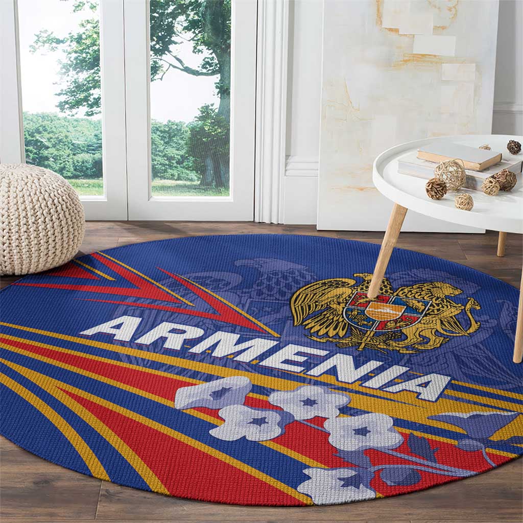 Round blue carpet with Armenia emblem, “ARMENIA” lettering, and multicolor stripes