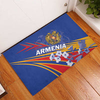 Blue rubber doormat featuring Armenia text, crest emblem, and colorful rays with flowers