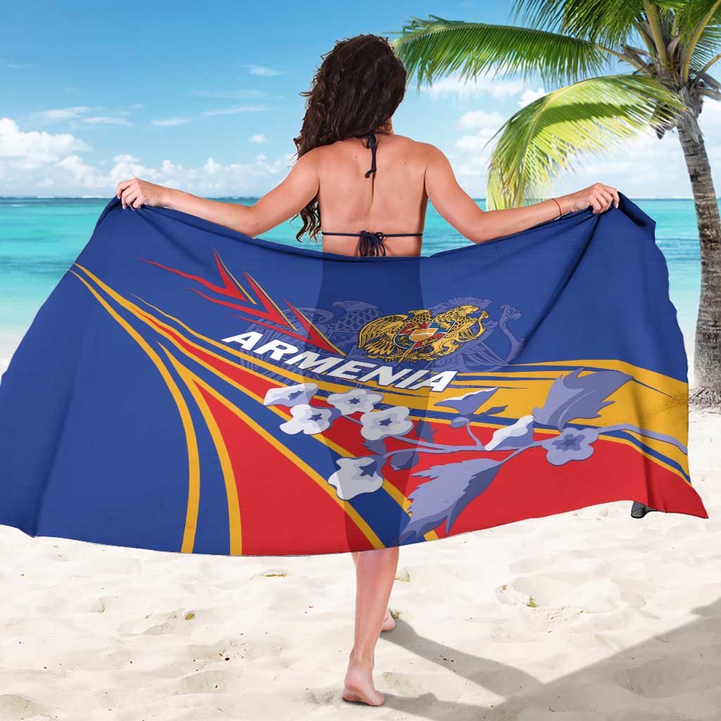 Blue sarong with Armenia flag graphic, held out wide in a beach wrap