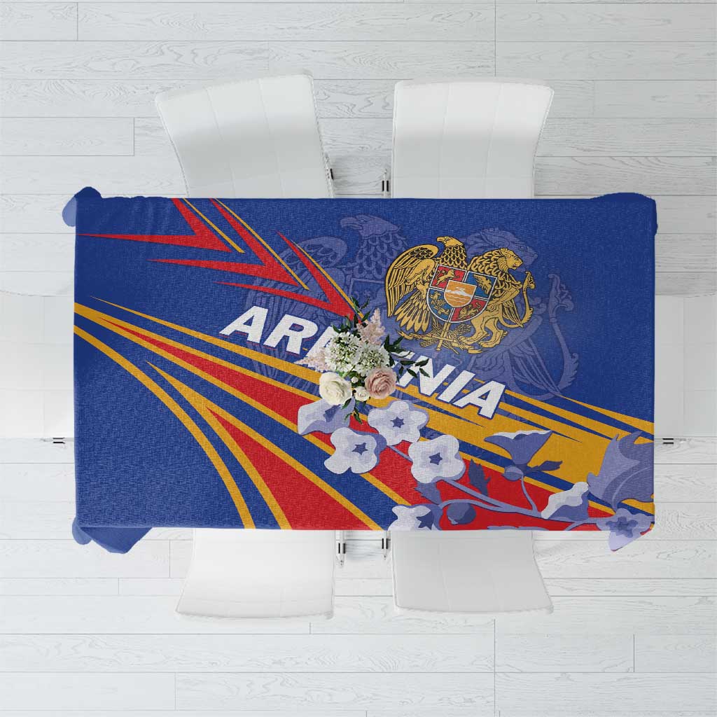 Blue tablecloth with Armenia-inspired colorful geometric pattern and central crest motif.