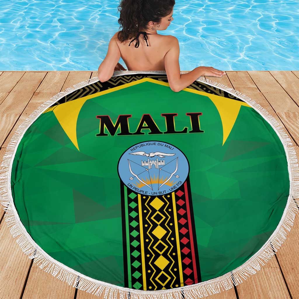 Green circular beach blanket with Mali crest center and white fringe edge, 150cm