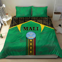 Green bedding set with Mali logo in middle, yellow arch accents, and two matching pillowcases