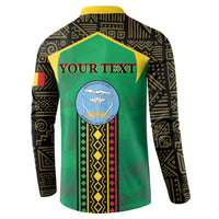 Green button sweatshirt with yellow collar, black patterned sleeves, back says "YOUR TEXT"
