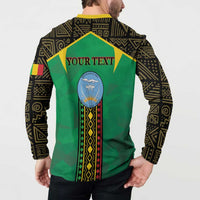 Green button sweatshirt with yellow collar, black patterned sleeves, back reads "YOUR TEXT"