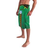 Green wrap skirt with patterned top band, vertical stripe print, layered hem