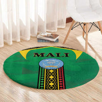 Green round carpet with “MALI” lettering, yellow star shapes, and a central multicolor geometric emblem.