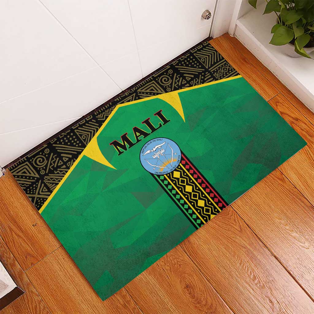 Rectangular green Mali rubber doormat with Mali text, circular emblem, black patterned trim