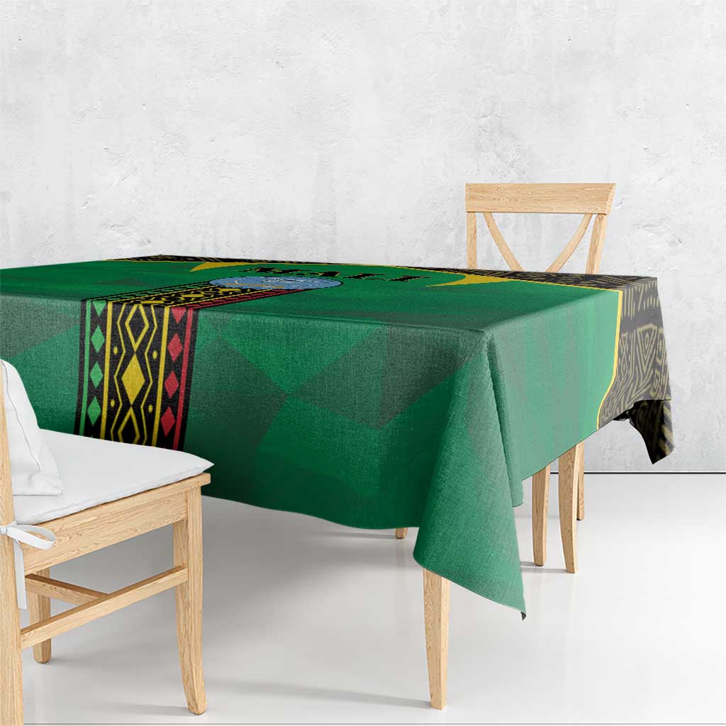 Green Mali tablecloth draped over a table with hanging corner