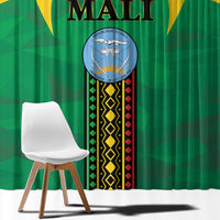 Green window curtain close-up with Mali crest, black patterned vertical stripe, and gold accents.