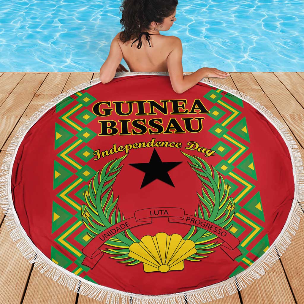 Round red beach blanket with fringed edge, Guinea-Bissau independence graphic, by pool