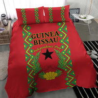 Red comforter and pillow shams with green decorative frame, wreath, and black star
