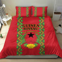 Red bedding set with central Guinea-Bissau graphic featuring black star and wreath