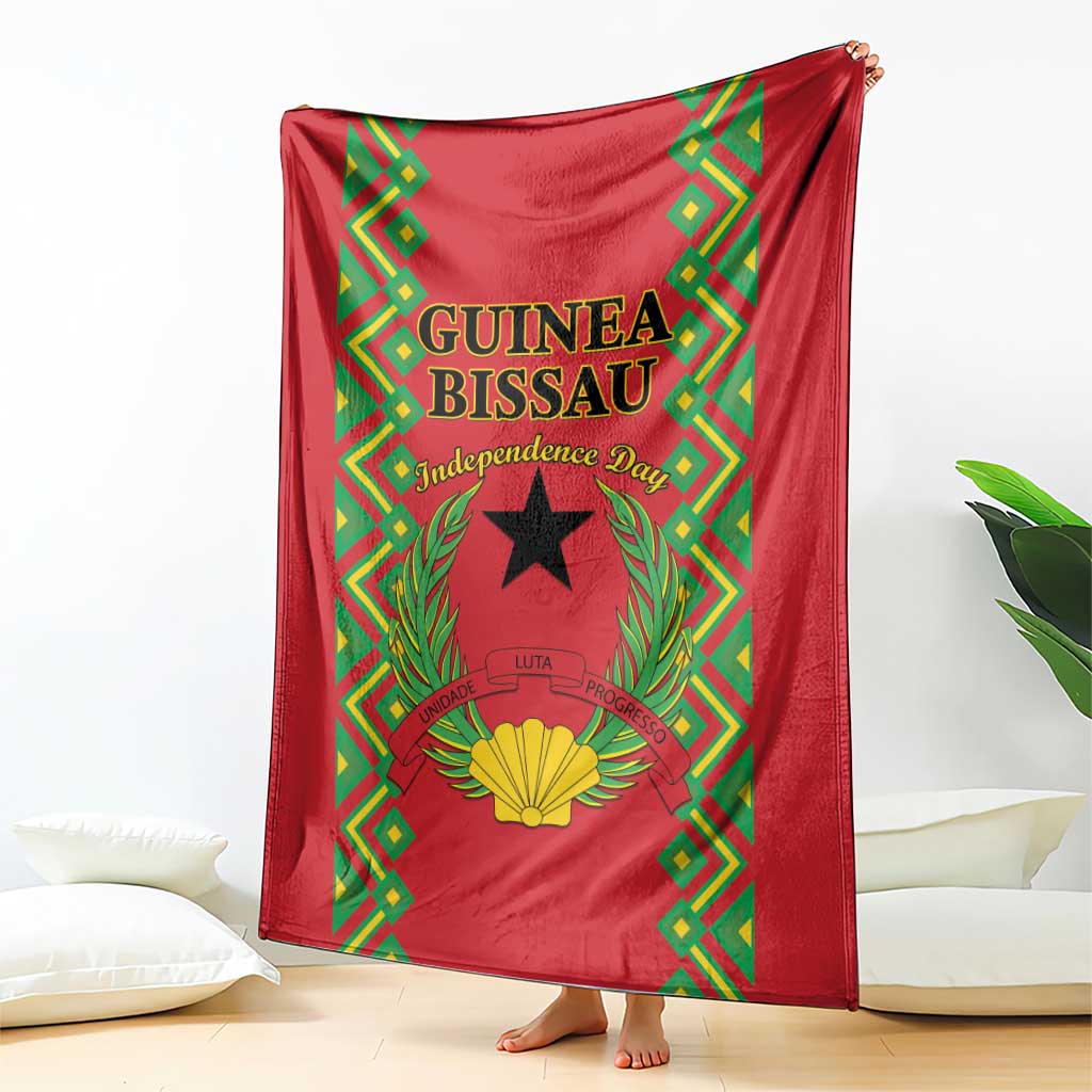 Red blanket draped with Guinea-Bissau Independence Day logo, black star and decorative frame