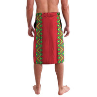 Red wrap skirt with green geometric border and stitched center panel