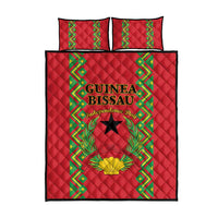 Red quilt bed set with green border, large centered black star, and floral laurel