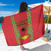 Red Guinea-Bissau graphic sarong with green geometric panel and black star emblem