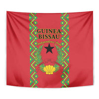Red Guinea-Bissau tapestry, close view: green decorative border, star emblem center.