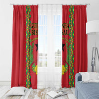 Red window curtain set with green-and-gold emblem panels and rod-top hanging tabs