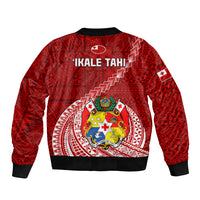 Red patterned bomber jacket with ribbed cuffs and large crest graphic on back
