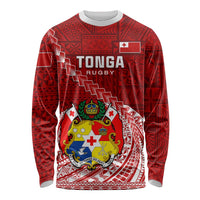 Red long-sleeve rugby shirt with white geometric pattern, crest graphic and Tonga text