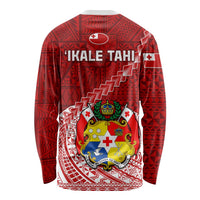 Red long-sleeve rugby shirt with white pattern and crest, 'IKALE TAHI' lettering