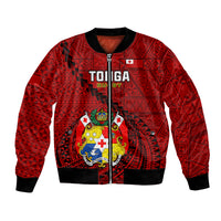 Red bomber jacket with front zipper and large crest graphic, black ribbed cuffs.