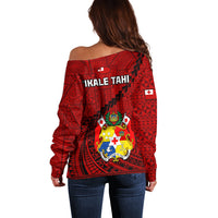 Red off-shoulder rugby sweater, back print with crest and 'IKALE TAHI' text