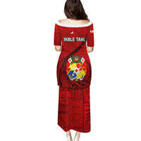 Red long back dress with Tonga crest and 'Ikale Tahi'; short sleeves, scoop neck