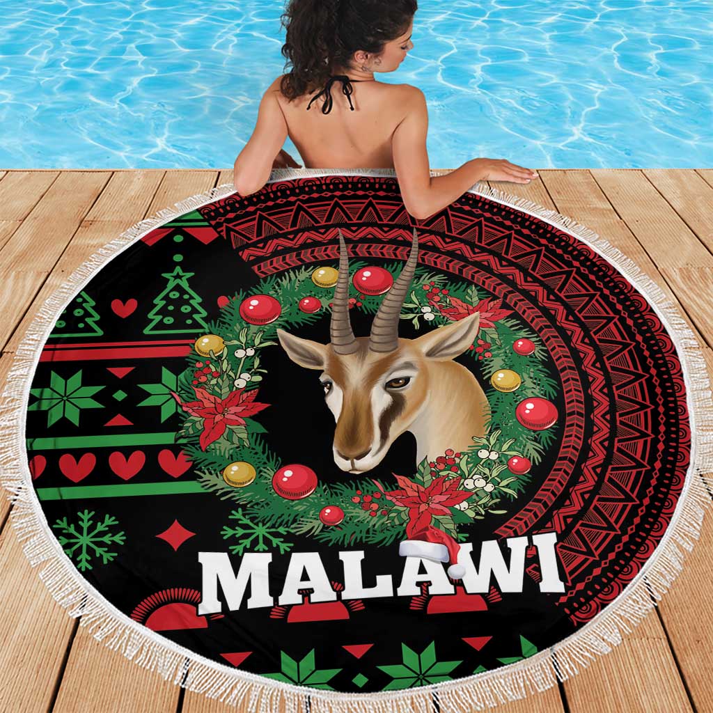 Round Christmas beach blanket with fringe, black base with gazelle center and MALAWI lettering
