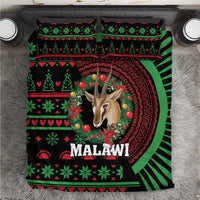 Black Malawi Christmas bedding set with antelope face and green/red festive patterns
