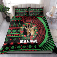 Black Malawi bedding set with antelope head centerpiece and green/red holiday stripes