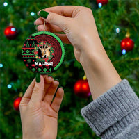 Round MALAWI ceramic ornament with gazelle head and festive green-red patterned design