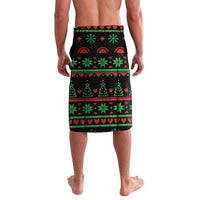Knee-length lavalava shorts in black with green and red holiday trees heart pattern