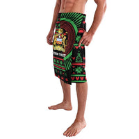 Knee-length lavalava shorts in black with green and red circular crest graphic