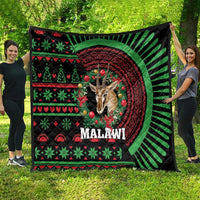 Black Malawi Christmas quilt, giraffe face in red mandala with green striped rays