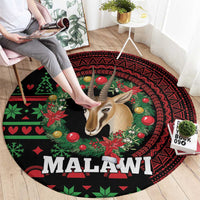 Round rug, black/red/green Malawi print with gazelle close-up and festive icons