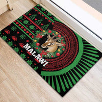 Christmas rubber doormat, black base with green-red Malawi mandala and gazelle center