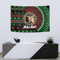 Black and green tapestry featuring deer head in wreath and “MALAWI” lettering