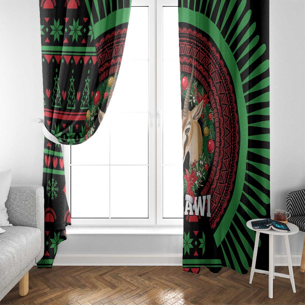 Black window curtain close-up with green/red African festive pattern, deer face and sunburst