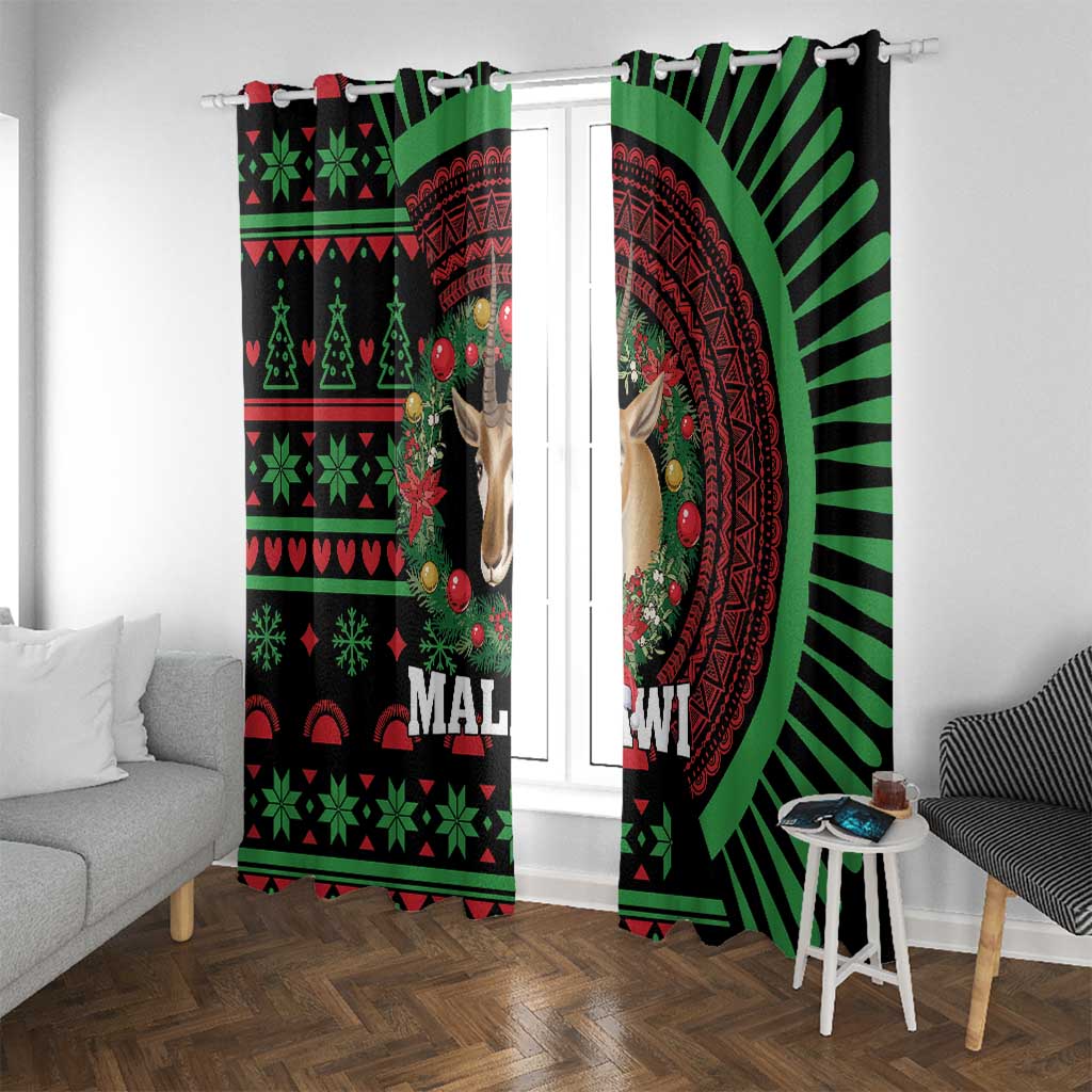 Black holiday window curtain with green and red African pattern, deer face and sunburst on one panel