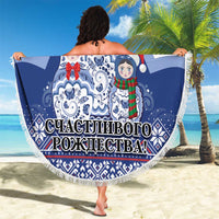 Round blue Christmas beach blanket with matryoshka dolls and tassel fringe