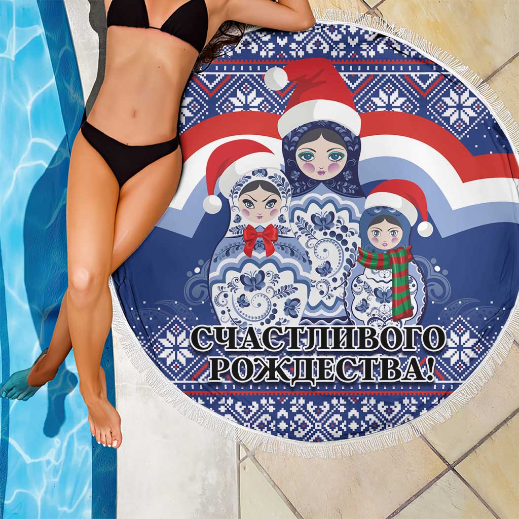 Round blue Christmas beach blanket with matryoshka dolls and fringe edge